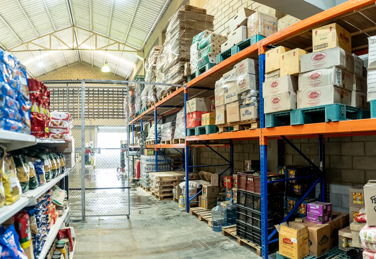 An aisle of our Cartagena warehouse with dry stores on pallets